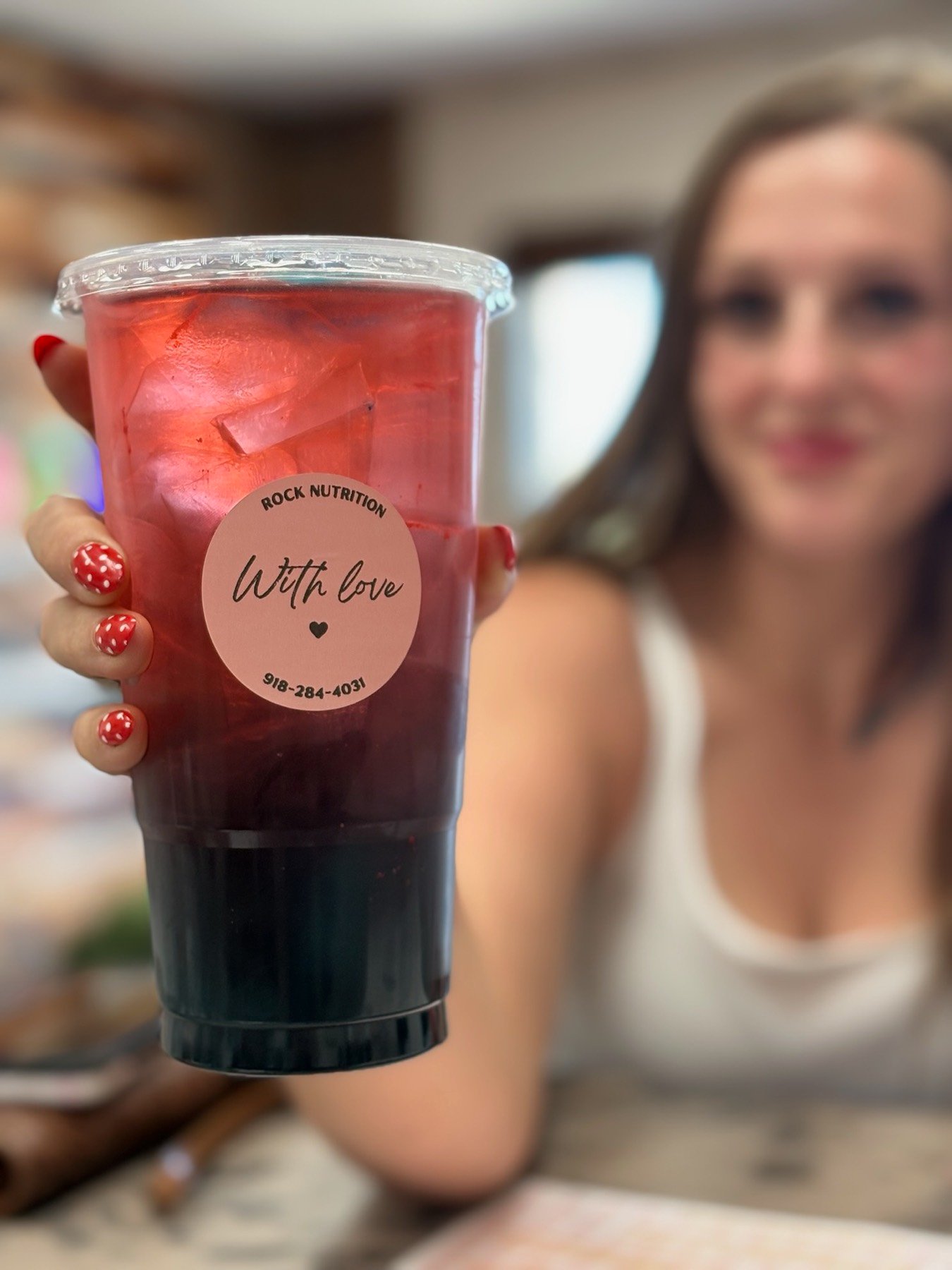 A Rock Nutrition energy tea with a hand-lettered cup sticker